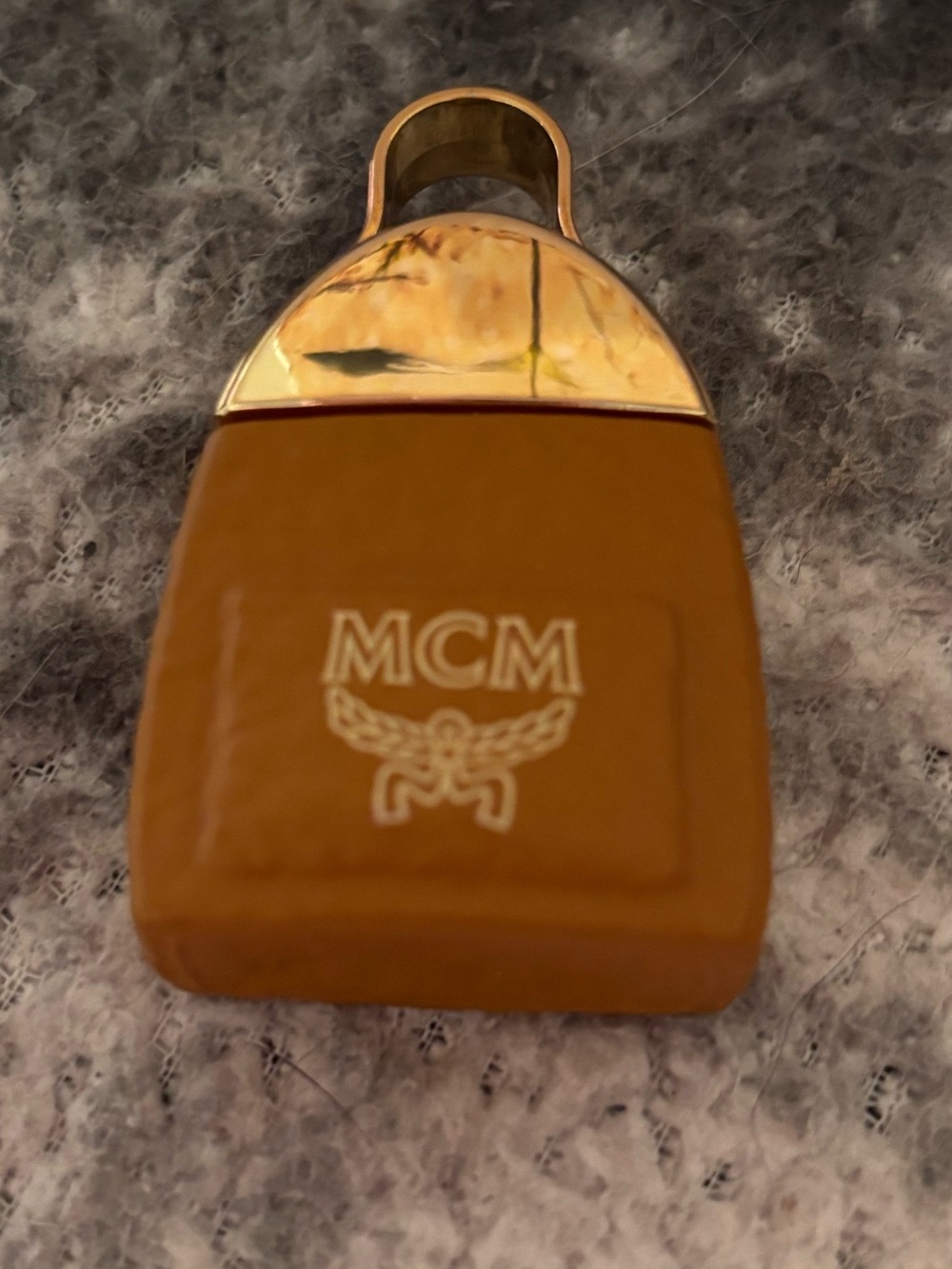 MCM lock charm could be used as a purse charm
